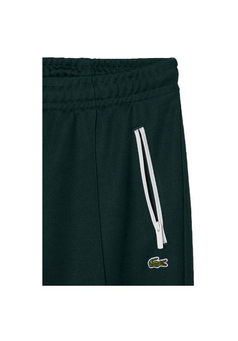 Pantalone Lacoste donna XF5253 Verde piqué interlock in misto cotone organico  taglio svasato con pieghe frontali e posteriori LACOSTE | Pantaloni | XF5253YZP