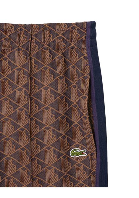 Pantalone LACOSTE uomo XH1440 Marrone jacquard con monogramma taglio dritto tasche a filetto coulisse con cordoncino in vita LACOSTE | Pantaloni | XH14409I4